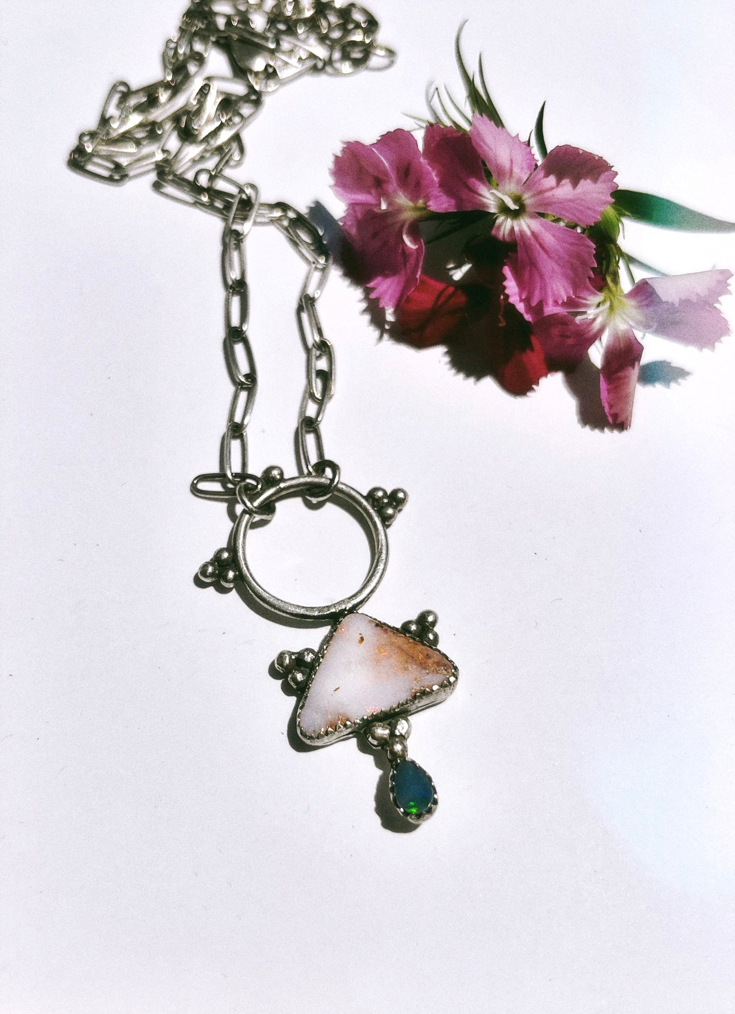 pink boulder opal talisman