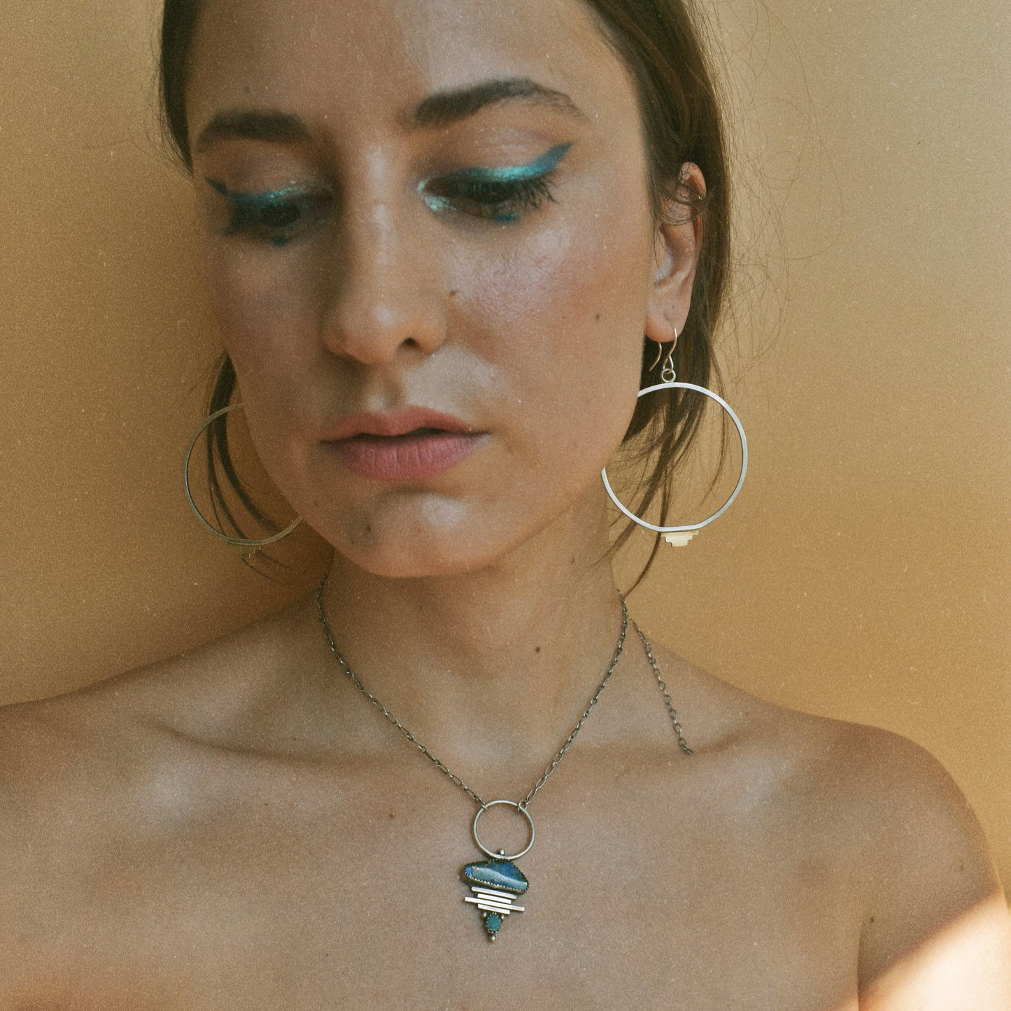 geometric pattern hoops earrings